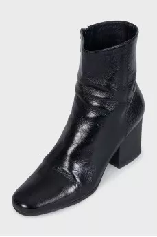 Black leather boots with heels