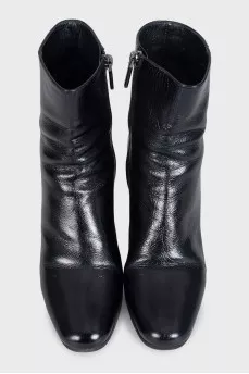 Black leather boots with heels
