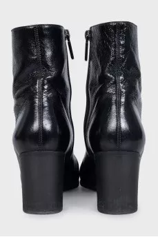 Black leather boots with heels