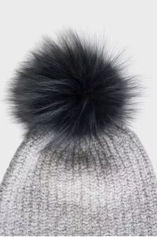 Gray knitted hat with a pompom