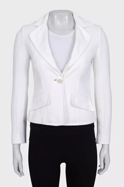 White fitted jacket with a button
