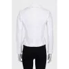 White fitted jacket with a button