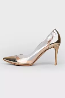 Golden shoes with transparent inserts