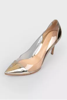 Golden shoes with transparent inserts