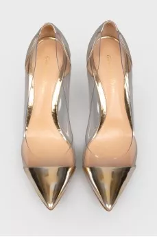Golden shoes with transparent inserts