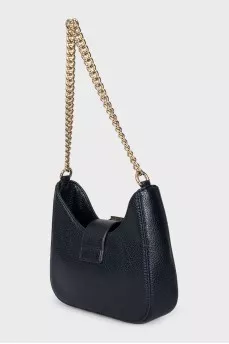 Leather bag with a volumetric lock
