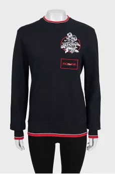 Black sweatshirt with a patch
