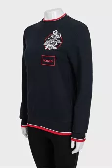 Black sweatshirt with a patch
