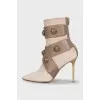 Beige ankle boots with gold heels