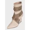 Beige ankle boots with gold heels