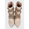 Beige ankle boots with gold heels