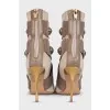 Beige ankle boots with gold heels
