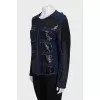 Cardigan with a zipper decorated with sequins
