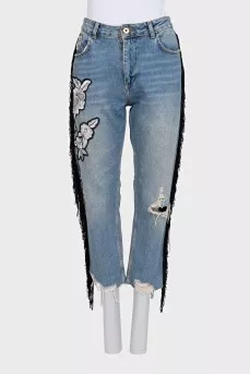 Blue jeans with fringe and embroidery