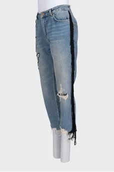 Blue jeans with fringe and embroidery