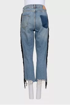 Blue jeans with fringe and embroidery