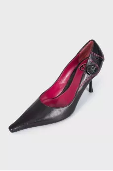 Black leather shoes with a button