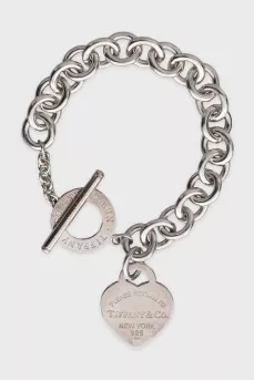 Silver bracelet with an accent pendant