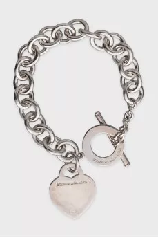 Silver bracelet with an accent pendant