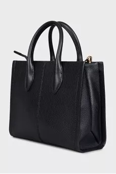 Black tote bag with branded embossing and white strap