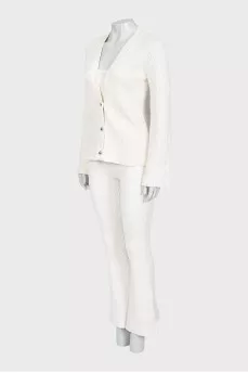 White suit with trousers, a top and a cardigan