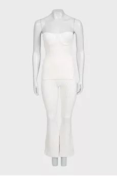 White suit with trousers, a top and a cardigan
