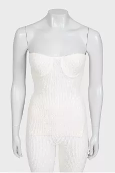 White suit with trousers, a top and a cardigan