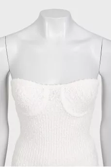 White suit with trousers, a top and a cardigan