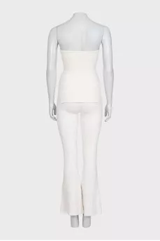White suit with trousers, a top and a cardigan
