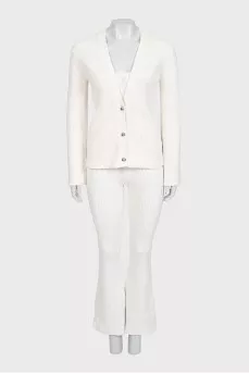 White suit with trousers, a top and a cardigan