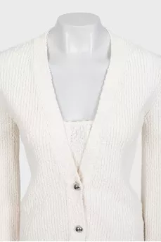 White suit with trousers, a top and a cardigan