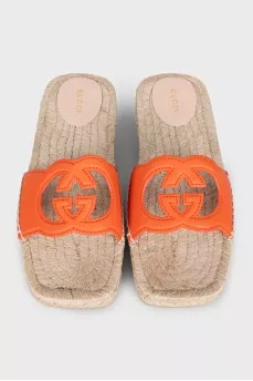Orange leather and raffia slides