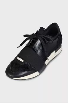 Black sneakers with textile inserts
