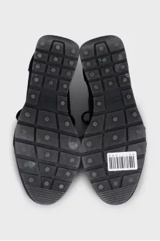 Black sneakers with textile inserts
