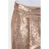 Pleated skirt decorated with sequins