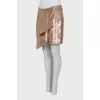 Pleated skirt decorated with sequins