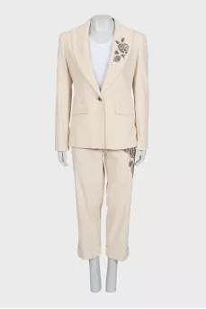 Beige suit with beaded embroidery