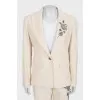 Beige suit with beaded embroidery