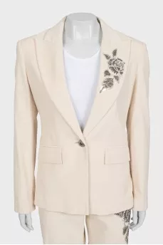 Beige suit with beaded embroidery