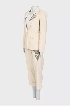 Beige suit with beaded embroidery