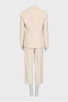 Beige suit with beaded embroidery