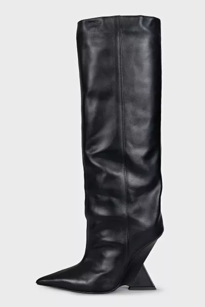 Black leather boots with a shaped heel