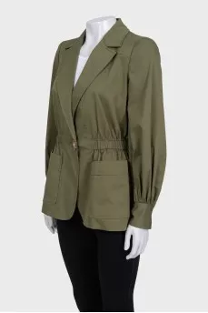 Green fitted jacket with a button