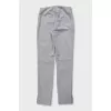 Gray suit with a top and trousers