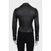 Black leather jacket with perforated sleeves