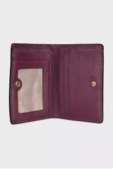 Leather wallet with a button and a brand logo