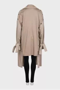Brown raincoat with a detachable element
