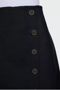 Black skirt decorated with buttons