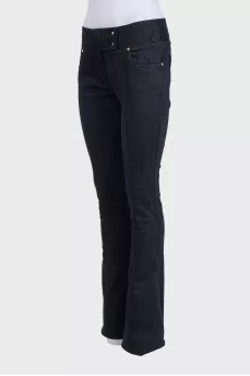 Black flared jeans with gold hardware