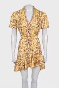 Yellow dress with a floral print belt